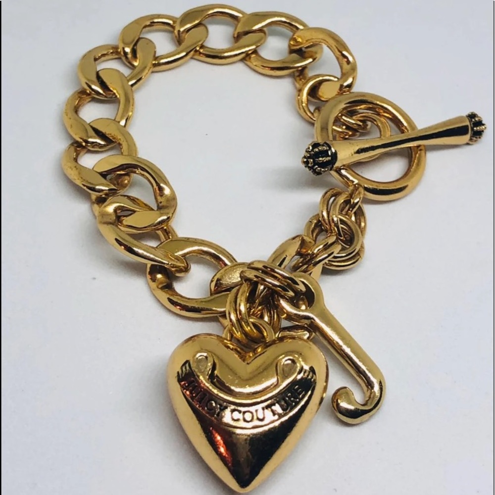 Juicy Couture “J” Heart Charm Gold Tone Link Toggle Bracelet.